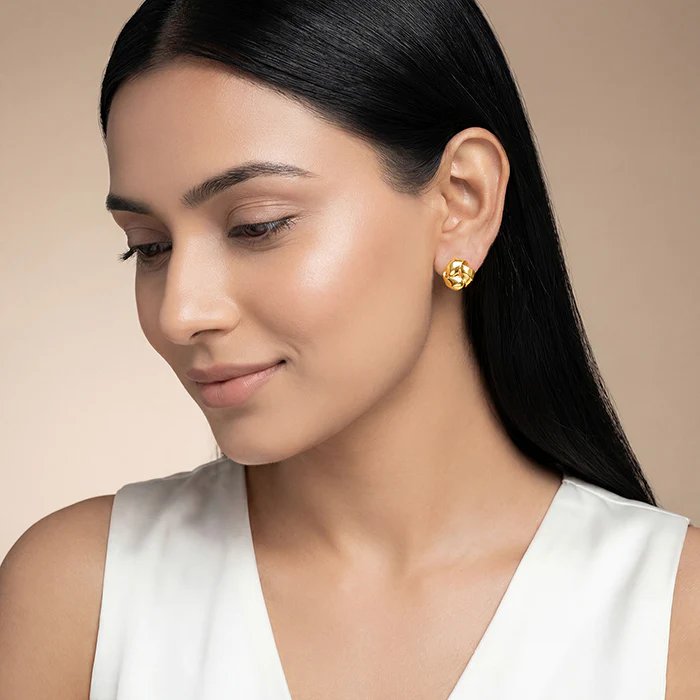 Golden Sculpted Floral Stud Earrings - Image 3