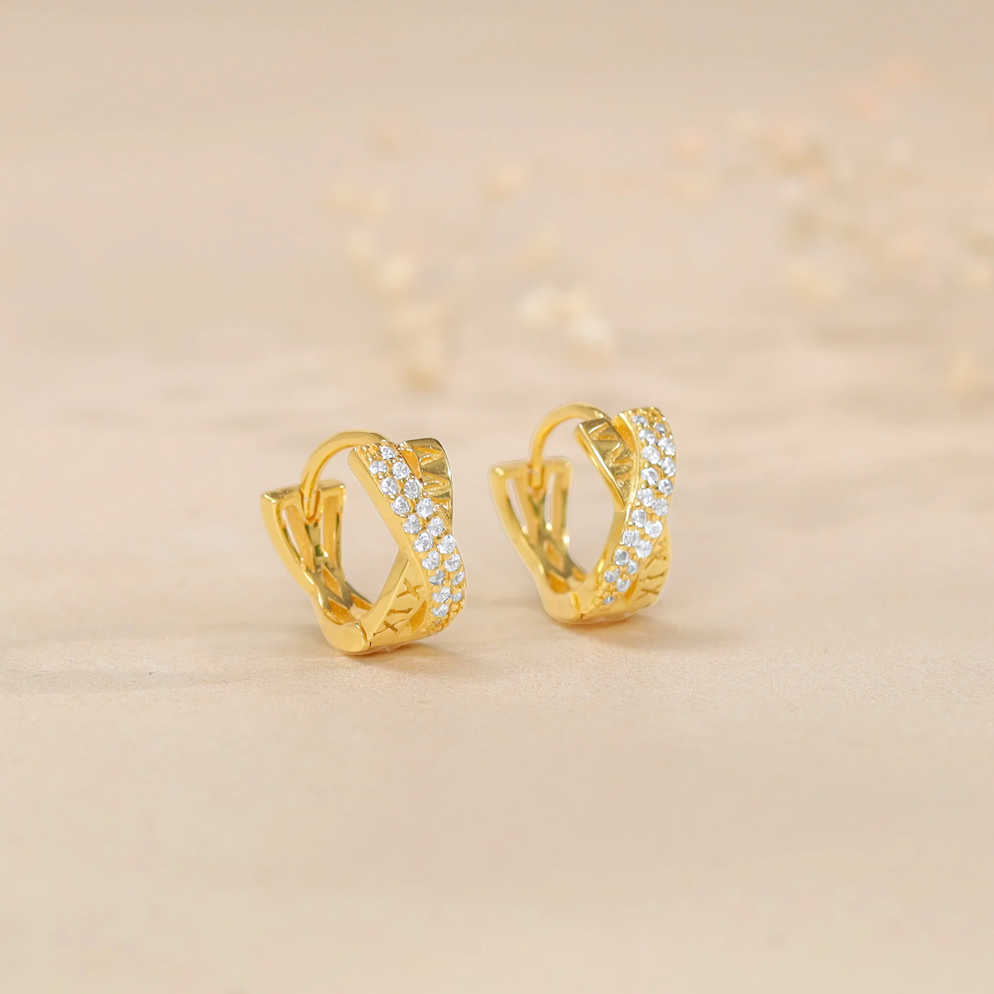 Golden Zircon Studded Twisted Huggies Earrings - Image 2
