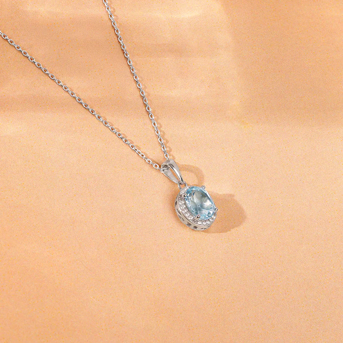 Silver Halo Blue Topaz Pendant With Link Chain - Image 2