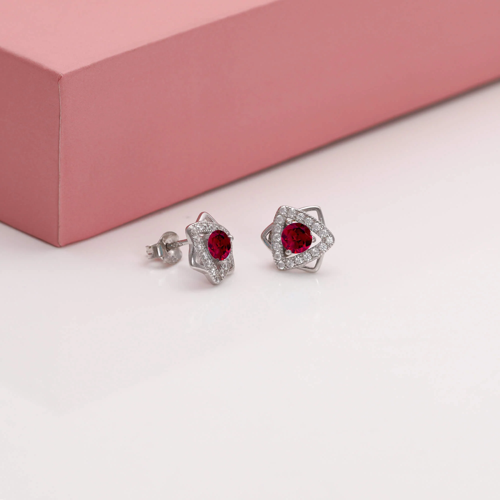 Silver Ruby Red Star Earrings - Image 2